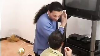 The blonde is having fun with two guys who repaired her TV