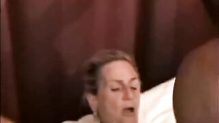 A mature woman has sex with a young and huge black man’s dick