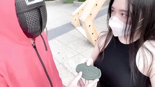 A hot Chinese girl participates in a twisted version of the Squid Game, competing for sex