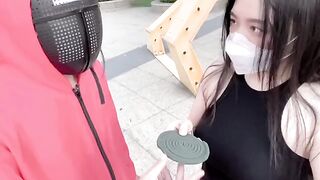 A hot Chinese girl participates in a twisted version of the Squid Game, competing for sex