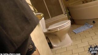 A woman has sex at home with a man and he comes inside her