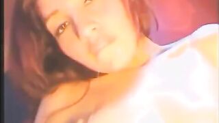 The girl caresses herself with a vibrator in all holes
