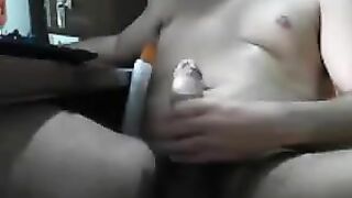 Front of the computer and masturbation of the penis