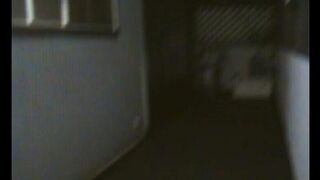 A fat woman is dancing naked in front of her husband