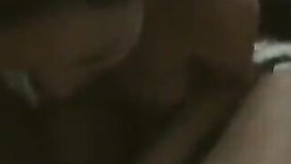 A fat woman is dancing naked in front of her husband