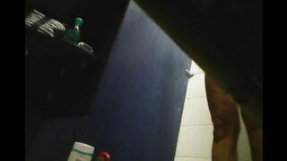 A girl has no shame and caresses her pussy under the shower head