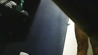 A girl has no shame and caresses her pussy under the shower head