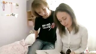 A girl is having fun with her classmate at her home after classes