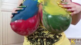 Creating art with her fingers and big boobs