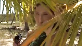 A couple has anal sex directly on the sandy beach