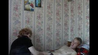 An old mother makes love with her son on a hidden camera