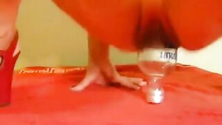 Fisting with a bottle and large dildo, a wild solo act