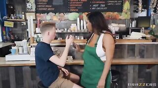 The girl with big boobs works as a barista in the coffee shop