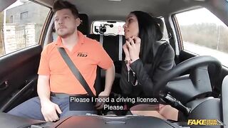 The girl is trying to seduce a guy in the car