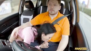 The girl is trying to seduce a guy in the car