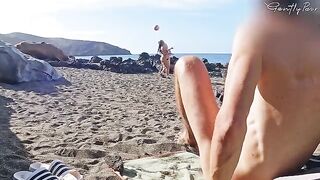 Two hot girls almost got caught jerking on a nude beach