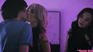 An Asian girl and a blonde are fucking with a guy