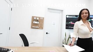 The girl was pleasantly surprised by her coworker in the office