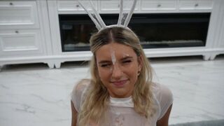 A cute girl got her face covered in decoration and received a huge portion of cream