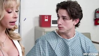 A sexy blonde in a hospital setting, engaging in intimate acts