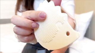 A Japanese woman has an orgasm and squirts with her huge boobs