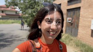 A girl is crazy, she sucks cock in the yard and gets a huge cumshot on her face