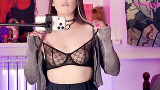 A girl caressed herself with a mirror, showcasing her anticipation and allure