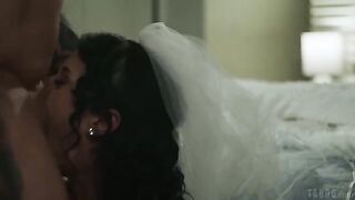 Girl with a tattoo licks the cock of her lover on the bed