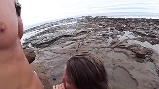 The girl is not ashamed to have sex on the beach and masturbate publicly
