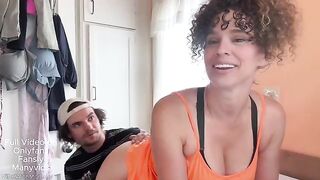 A woman is doing laundry when a man comes to ask for money