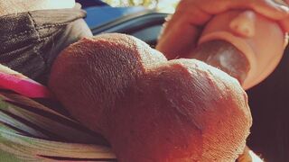 A girl with a silicone mouth works outdoors and sucks passionately, just like in steamy homemade videos