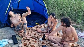 Two girls are having sex in the woods just like at home
