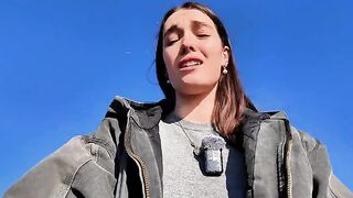 A petite babe masturbates outdoors on a mini skirt risking getting caught