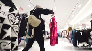 The girl was almost caught while giving a blowjob in the fitting room