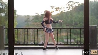 The cute Asian girl Jasmine J gets fucked by a machine on her balcony