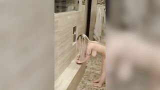 Busty girl has sex with her fuck machine in the shower